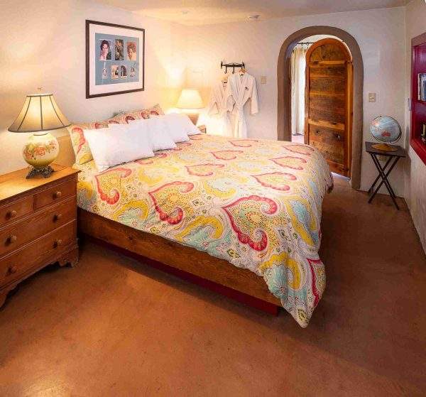 Comfy king bed in the As The World Turns room