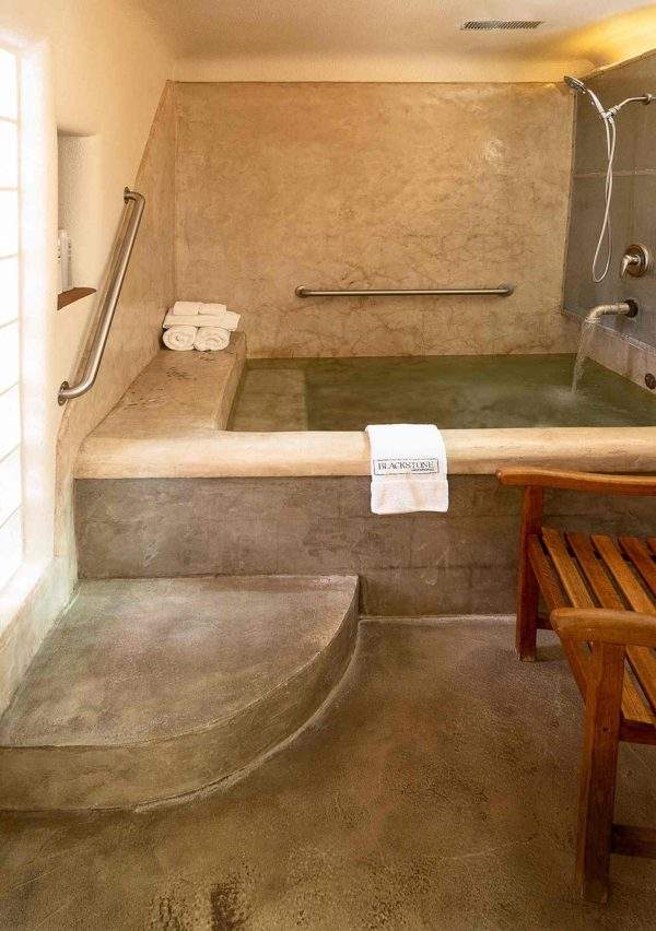 the hot spring bath in the Superman room at Blackstone Hotsprings