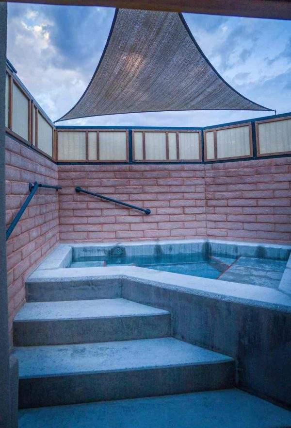 private patio, private hotspring bath at the Lone Ranger room, Blackstone Hotsprings
